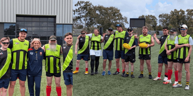 Two groups of Australian rules football players in black and lime green kits pose on a sports pitch.