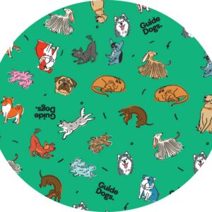 Illustration of various dog breeds on a green background with the words "Guide Dogs" scattered throughout on a bandana available in two sizes.
