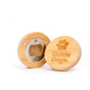 Wooden bottle opener with Guide Dogs and a paw print engraved on the top, shown in two sections: one with the metal opener and one with the engraving.