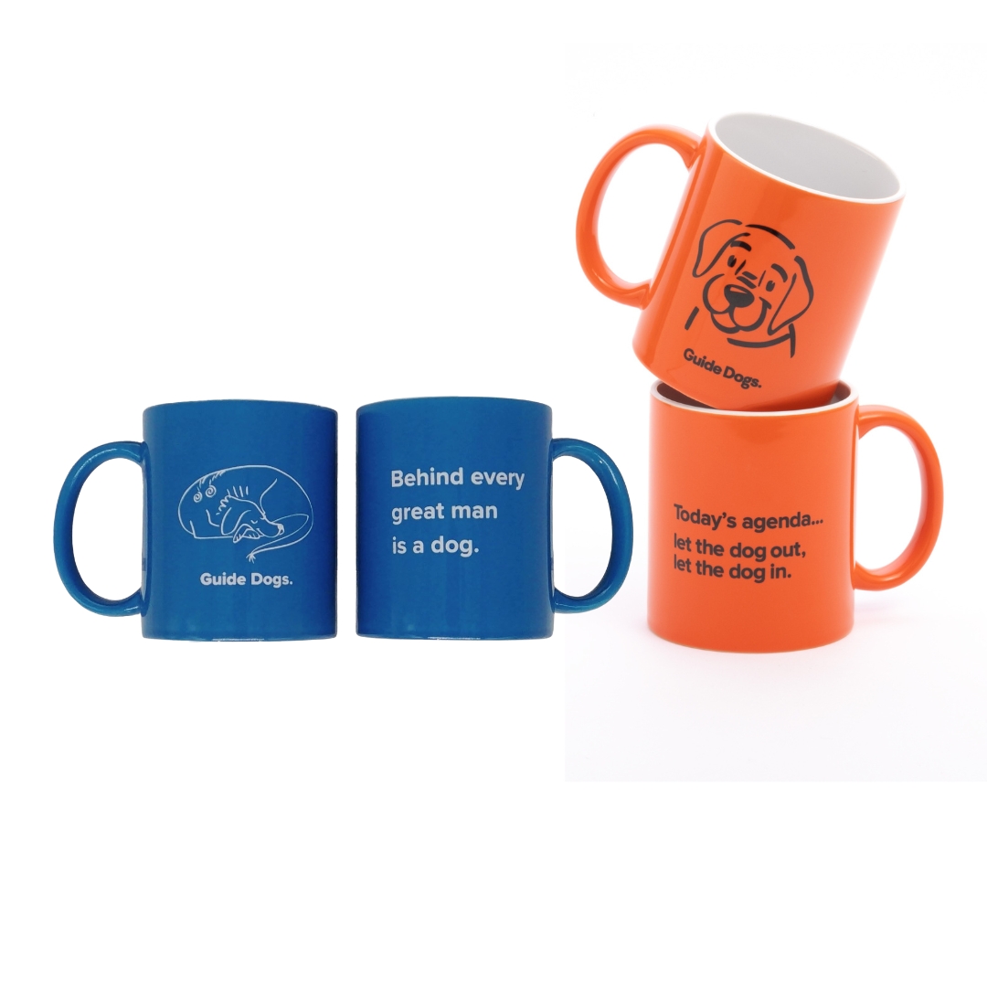 The Ceramic Mug set includes four dog-themed mugs. The blue mugs feature the text "Guide Dogs" and "Behind every great man is a dog," while the orange mugs display "Guide Dogs" and "Today's agenda... let the dog out, let the dog in.