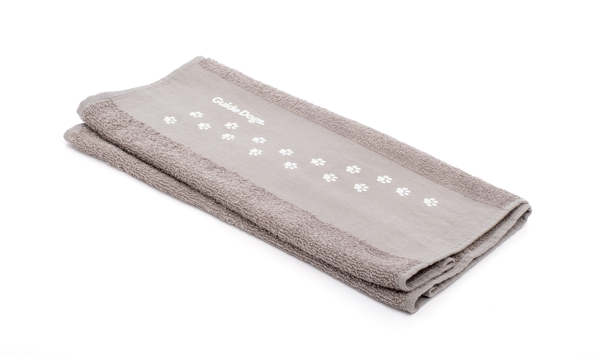 Folded gray towel with white paw prints and the words Guide Dogs embroidered on it, displayed on a white background.