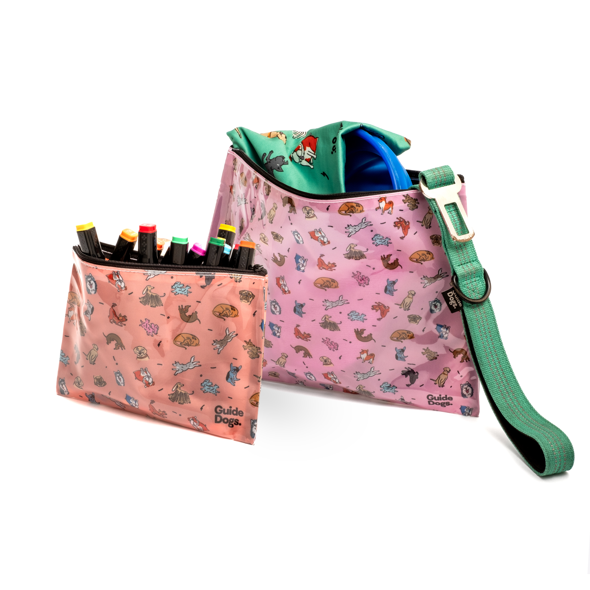 Two pink bags with colorful animal patterns are shown; one bag is larger with a green handle and the other is smaller, holding colored markers.
