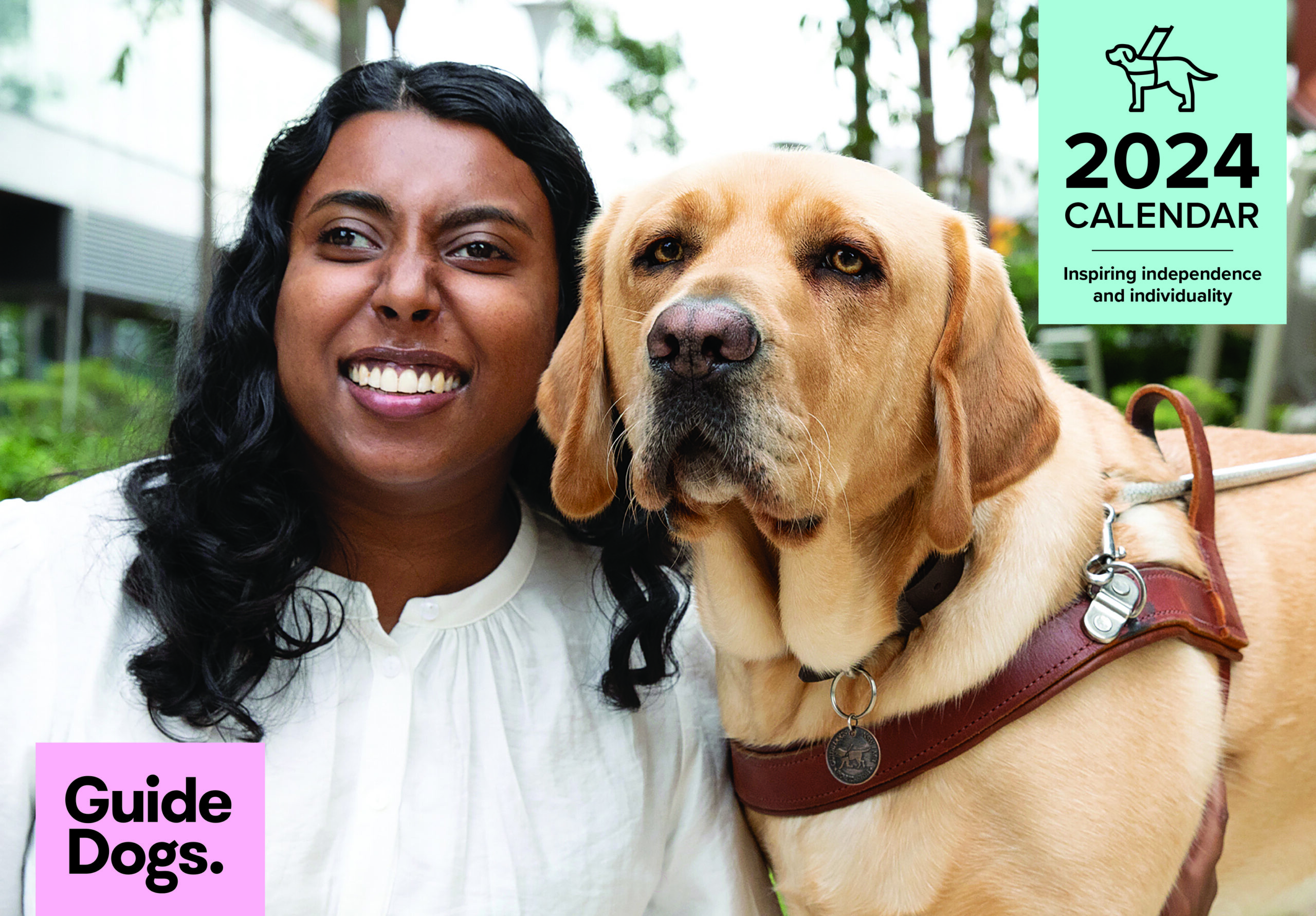A woman smiling beside a service dog in a harness, accompanied by the 2024 Calendar text.