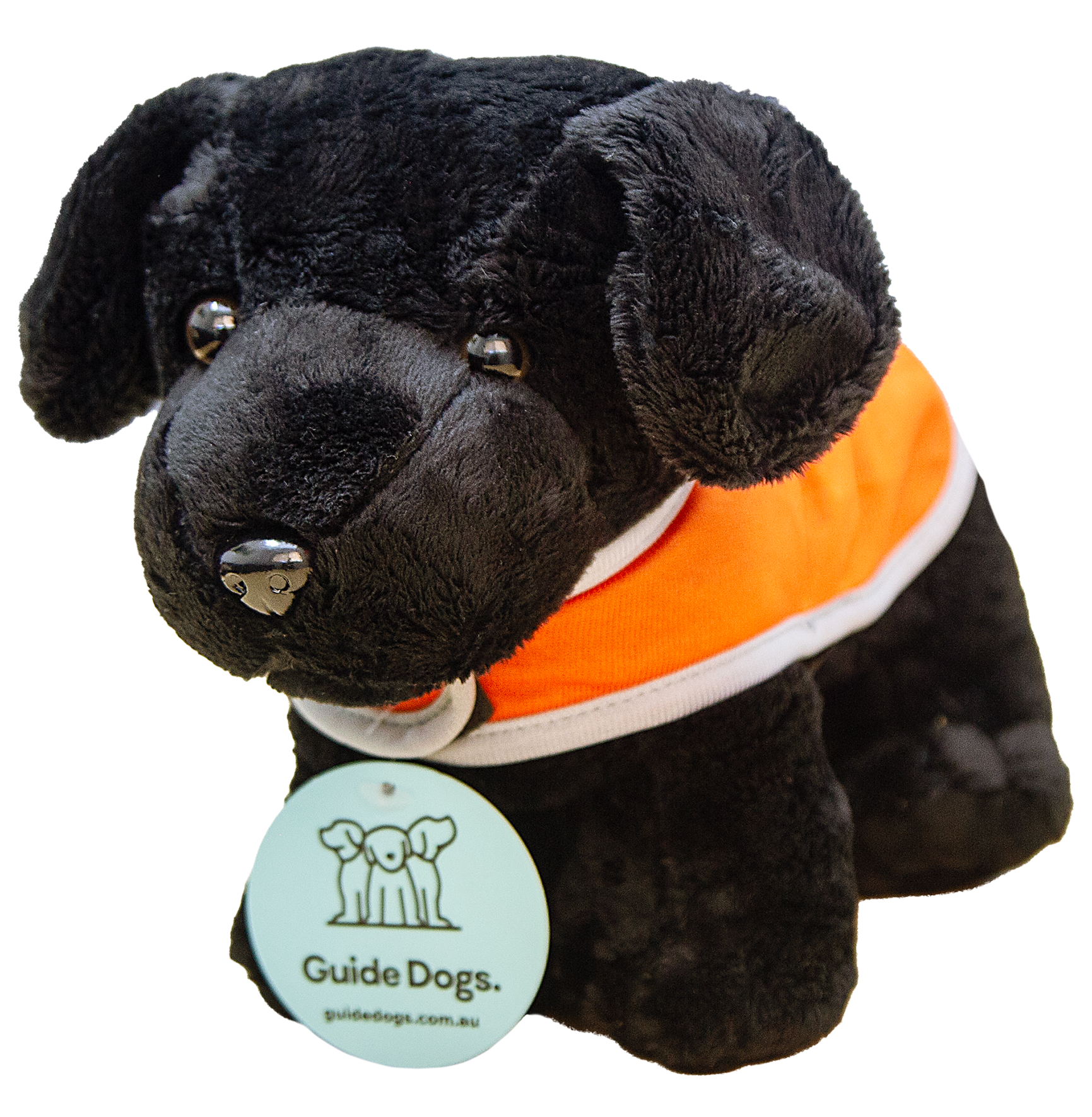 Plush black dog wearing an orange vest with a Guide Dogs tag hanging from its collar.