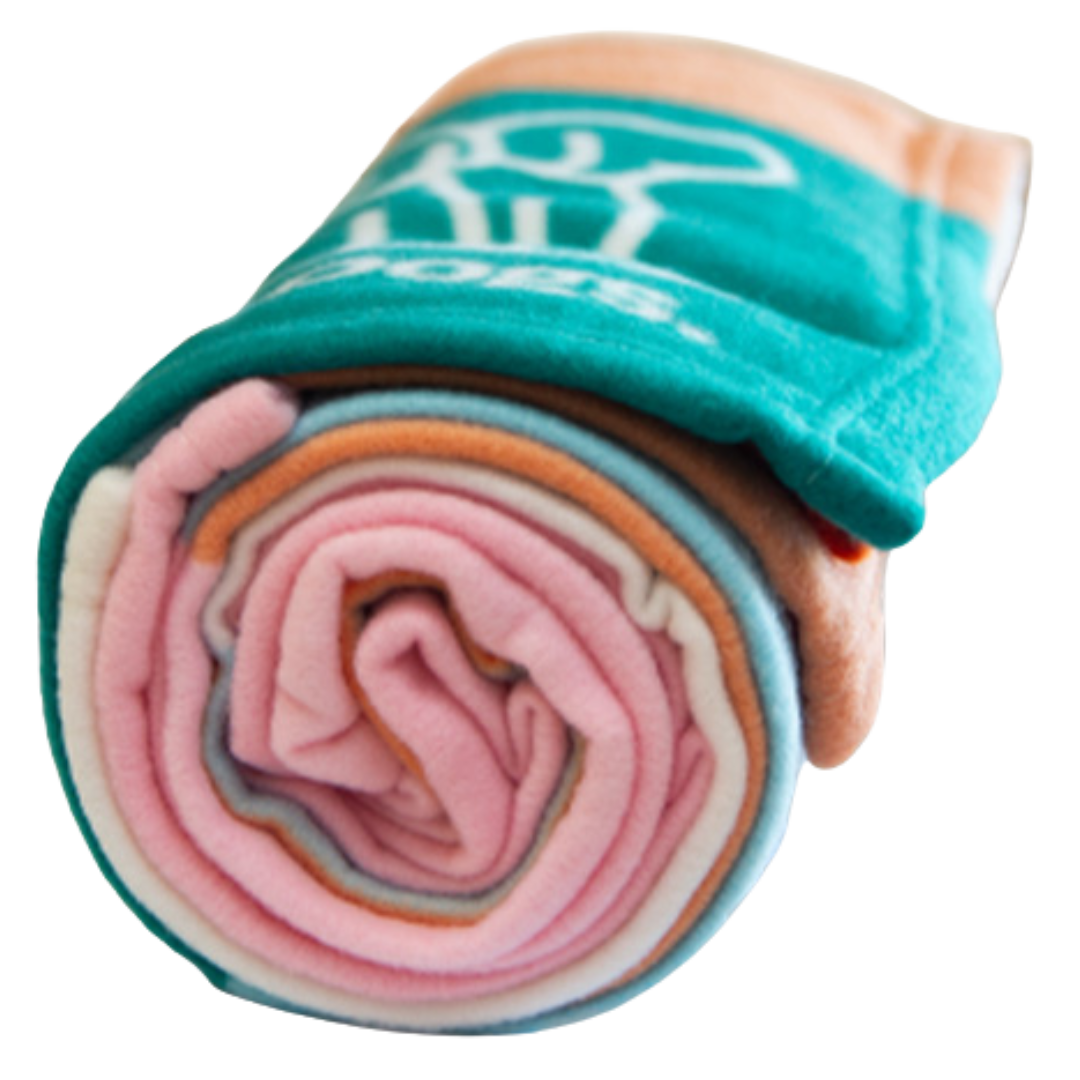A rolled-up Polar Fleece Rug in multiple colors, displaying pink, blue, orange, and green layers.