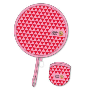 Twist Fan: A pink handheld fan with a red geometric pattern and the Guide Dogs logo showcasing a dog image. Comes with a matching pink pouch.