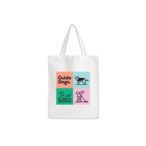 A black foldable bag featuring abstract designs of dogs in blue, pink, and green squares with the text "Guide Dogs.