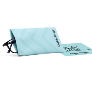 A turquoise Glasses Pouch with glasses partially inside, featuring the Guide Dogs text and logo. A matching lens cleaning cloth with the same logo is placed beside it.