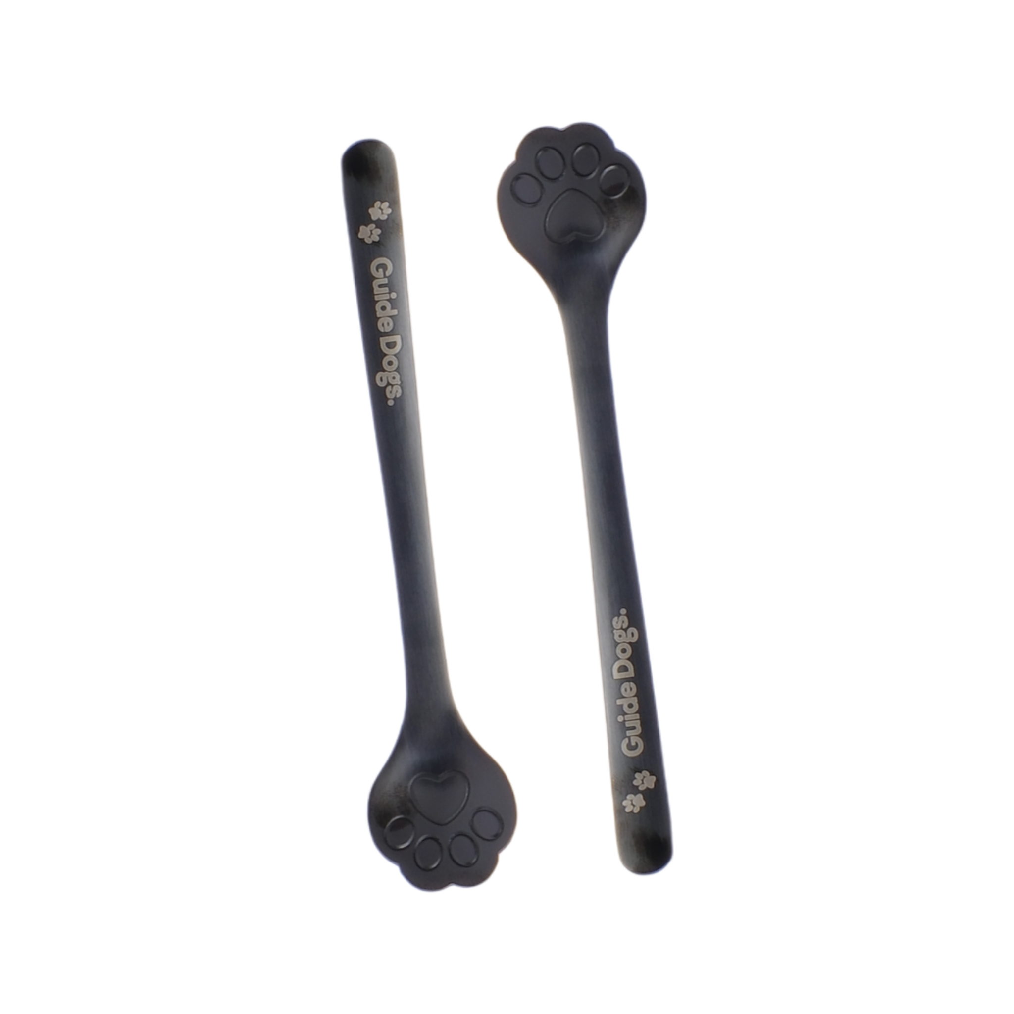 Set of two Paw Spoons - Black, each with a paw-shaped end and the Guide Dogs logo printed on the handle.